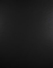 Deep black paper, subtly glossy surface  Smooth, elegant texture ,  dark background,  still life,  subtle texture
