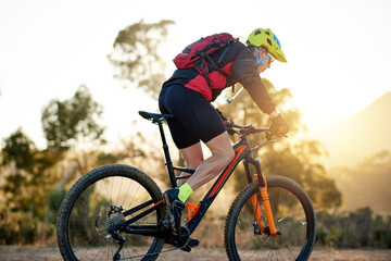 Cycling, mountain bike and man with training, nature and energy with hobby, adventure and sports. Bicycle, person and cyclist with practice, travel and trail with competition, countryside and journey