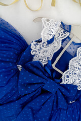 Blue Baby Dress On White Background With Decorations