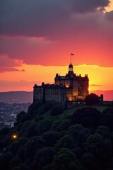 Fototapeta premium Golden hour illuminates Edinburgh Castle, iconic skyline silhouettes against fiery sunset , travel, clouds, sunset