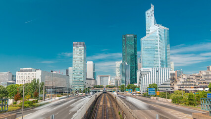 Office buildings in modern part of Paris - La Defense timelapse. Paris, France