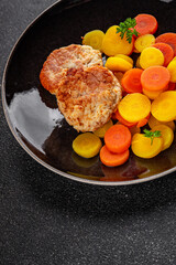Vegetarian cutlets and boiled carrots in a bowl natural food vegetables dish organic fresh gourmet food background on the table rustic food top view copy space keto paleo diet vegetarian vegan food
