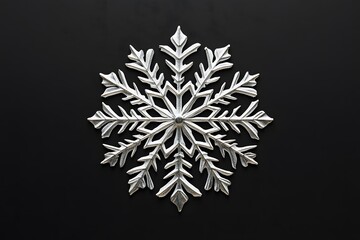 snowflake design with silver metallic geometric pattern in elegant abstract symmetry on a dark background for winter decor