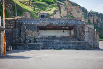 Double gun embrasure casemate at Omaha Beach, Normandy, France. German bunker able to fire east and...