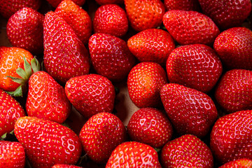 Strawberries fresh berries ripe red sweet fruit dessert dish delicious gourmet food background on...