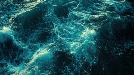 Fototapeta premium Turbulent, turquoise ocean waves' textured surface.