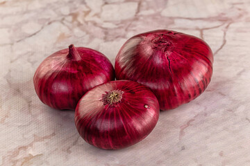 Raw ripe purple onion bulb