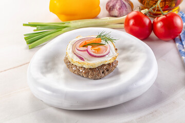 Beefsteak chop with roasted egg