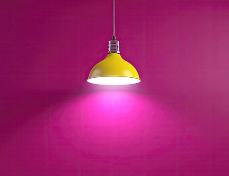 Yellow pendant light illuminates a magenta wall.  A bright, yellow light fixture hangs from a magenta wall, casting a soft glow