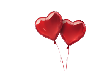 A pair of heart-shaped balloons floating against a clean white background