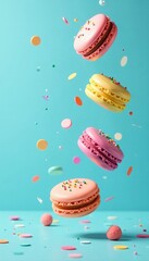 Colorful macarons floating above a bright turquoise background, perfect for dessert themes.