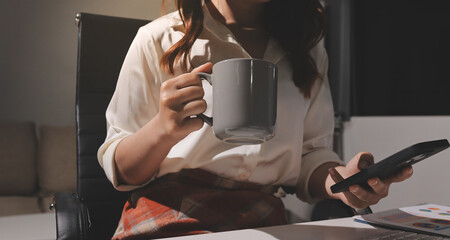 Expert woman asian female people review data number costing managerial account prepare monthly actual cost variance report at tax audit office. ESG sheet budget control ERP process service project.