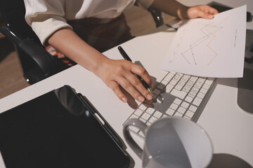 Expert woman asian female people review data number costing managerial account prepare monthly...