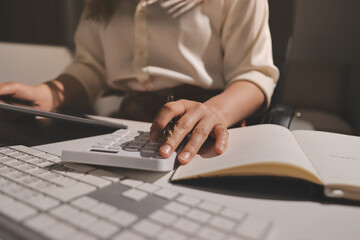 Expert woman asian female people review data number costing managerial account prepare monthly...