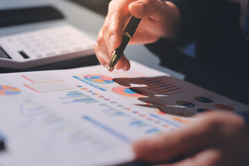 Expert woman asian female people review data number costing managerial account prepare monthly...