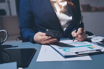 Expert woman asian female people review data number costing managerial account prepare monthly...
