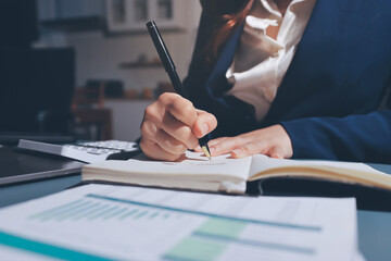 Expert woman asian female people review data number costing managerial account prepare monthly...