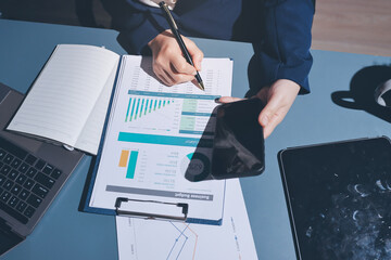 Expert woman asian female people review data number costing managerial account prepare monthly...