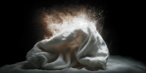 White Towel and Tan Dust Cloud