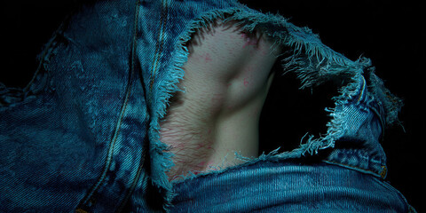 Close-up of Human Torso Partially Covered by Torn Denim