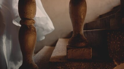 close-up female legs feet is climbing the stairs, walking up steps body part. Fantasy fairy lady princess girl wearing white vintage shoes, classic long silk dress old style. woman queen video art 4k