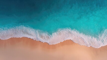 pristine beach shoreline aerial view from above using drone displaying golden sand meeting azure waters