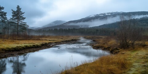 Serene mountain landscape with a flowing stream, mist gently rising in the cool morning air