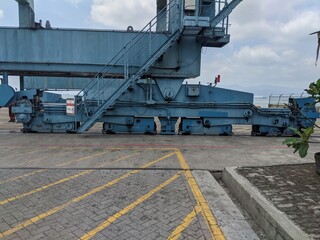 Industrial Port Crane Mechanism, Detailed View of Gantry Crane Undercarriage and Tracks at a Cargo...