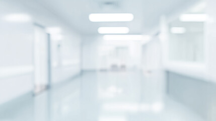 Bright, empty defocused hospital corridor background with copy space.