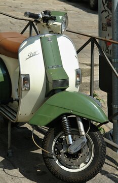 Classic green and white LML Star scooter parked on a sunny day