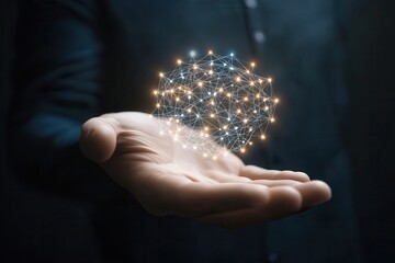 A person holding a glowing network of interconnected nodes in their palm, symbolizing technology