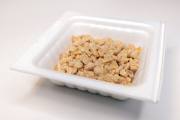 Crushed natto (fermented soybeans) in a pack