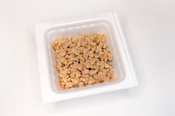 Crushed natto (fermented soybeans) in a pack