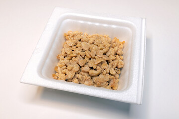 Crushed natto (fermented soybeans) in a pack