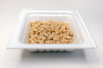Crushed natto (fermented soybeans) in a pack
