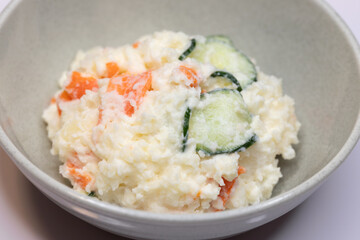 Close-up of Japanese potato salad with cucumber and carrot