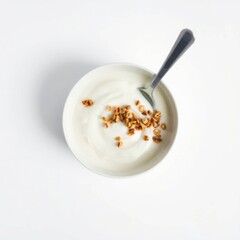 Fototapeta premium Yogurt bowl topped with granola and a spoon on a white backdrop, ideal for a healthy breakfast or snack.