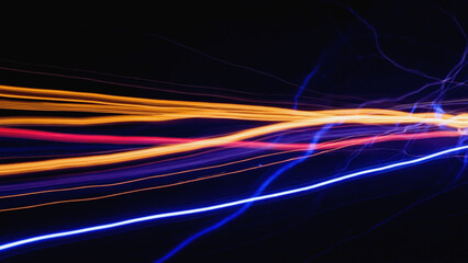 A blurred image of a street light in the evening or night