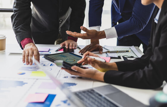 The business partner advisory meeting is discussing strategy analysis and business investment planning. Colleagues work together to plan a business project together.