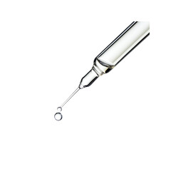 Fototapeta premium Close-up of Glass Dropper with Liquid Droplet