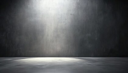 Indoor scene with light beam shining on gray cement wall and floor.