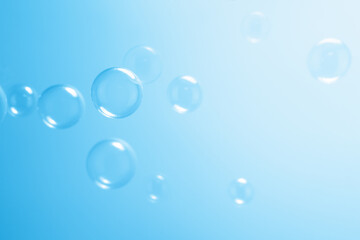 Beautiful Transparent Blue Soap Bubbles Floating in The Air. Freshness Soap Suds Bubbles Water. Celebration Festive Backdrop. Blue Bubbles Textured Background.	
