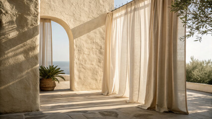 Soft beige stucco wall with soft curtain shadow creates peaceful outdoor space with arched doorway and ocean view, enhanced by natural light and potted plant