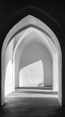 A sunlit, arched passageway