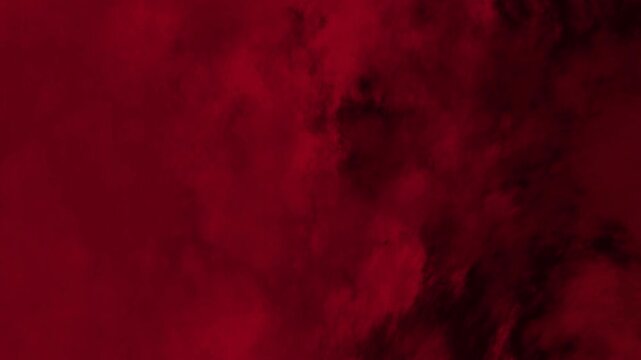 Dark red background with a smoke effect ideal for Halloween designs horrorthemed projects mysterious concepts or abstract backgrounds in graphic design