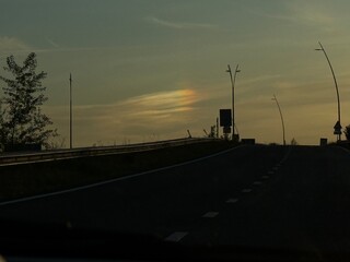 sunset in the city. Unusual rainbow