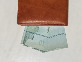 Currency notes, UAE Emirates currency 10Aed, Dirhams, Closeup of UAE Ten dirhams currency notes, paper money 10 Aed dirhams. Dirhams banknotes. UAE Emirati Paper currencies notes 10 Dirham currency