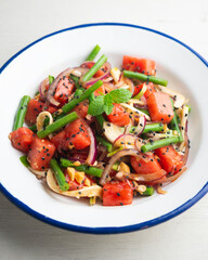 Summer salad with watermelon, fennel and green beans.