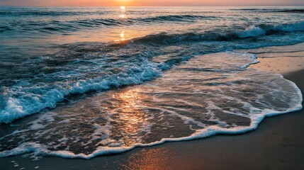 Serene Sunset Over Waves at Tranquil Beach Shoreline