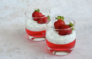 Strawberry dessert with jelly and yogurt decorated with strawberries